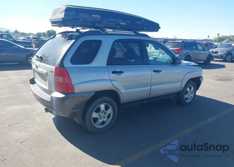 2007 Kia Sportage from USA, damaged, VIN KNDJE723277299935